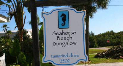 Seahorse Beach Bungalow street sign reading Seahorse Beach Bungalow Tamarind Drive 2502